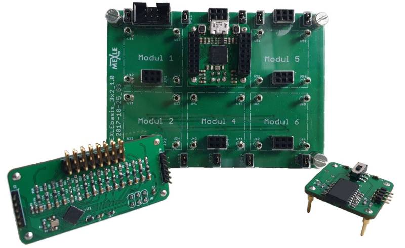 verschiedene_mexleplatinen_und_kleine_traegerplatine.jpg verschiedene_mexleplatinen_und_kleine_traegerplatine.jpg